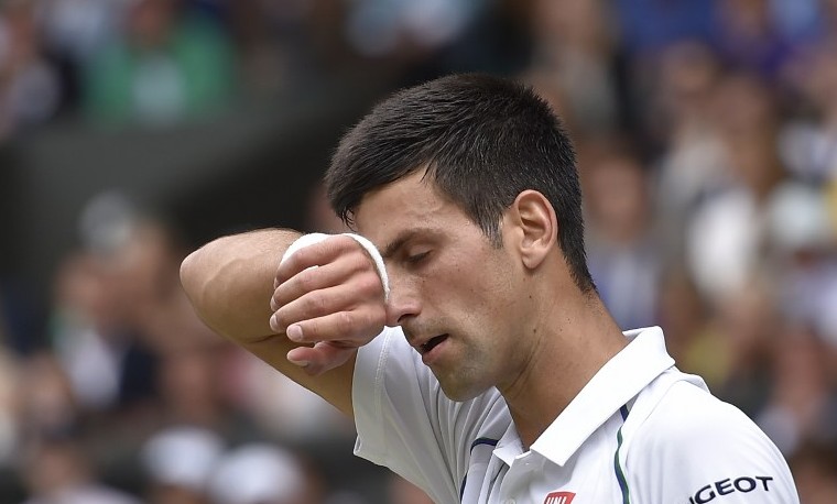 La lluvia interrumpe la final Djokovic-Federer en Wimbledon