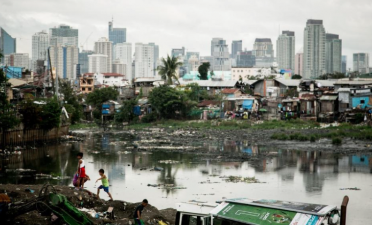 Barrio de chabolas en Tondo, Manila, Filipinas (2014). Crédito: Dewald Brand / Miran para Oxfam
